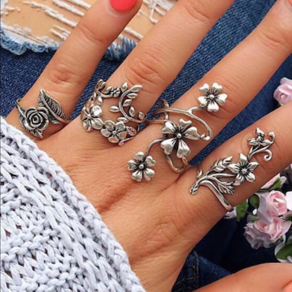 Four piece floral ring set